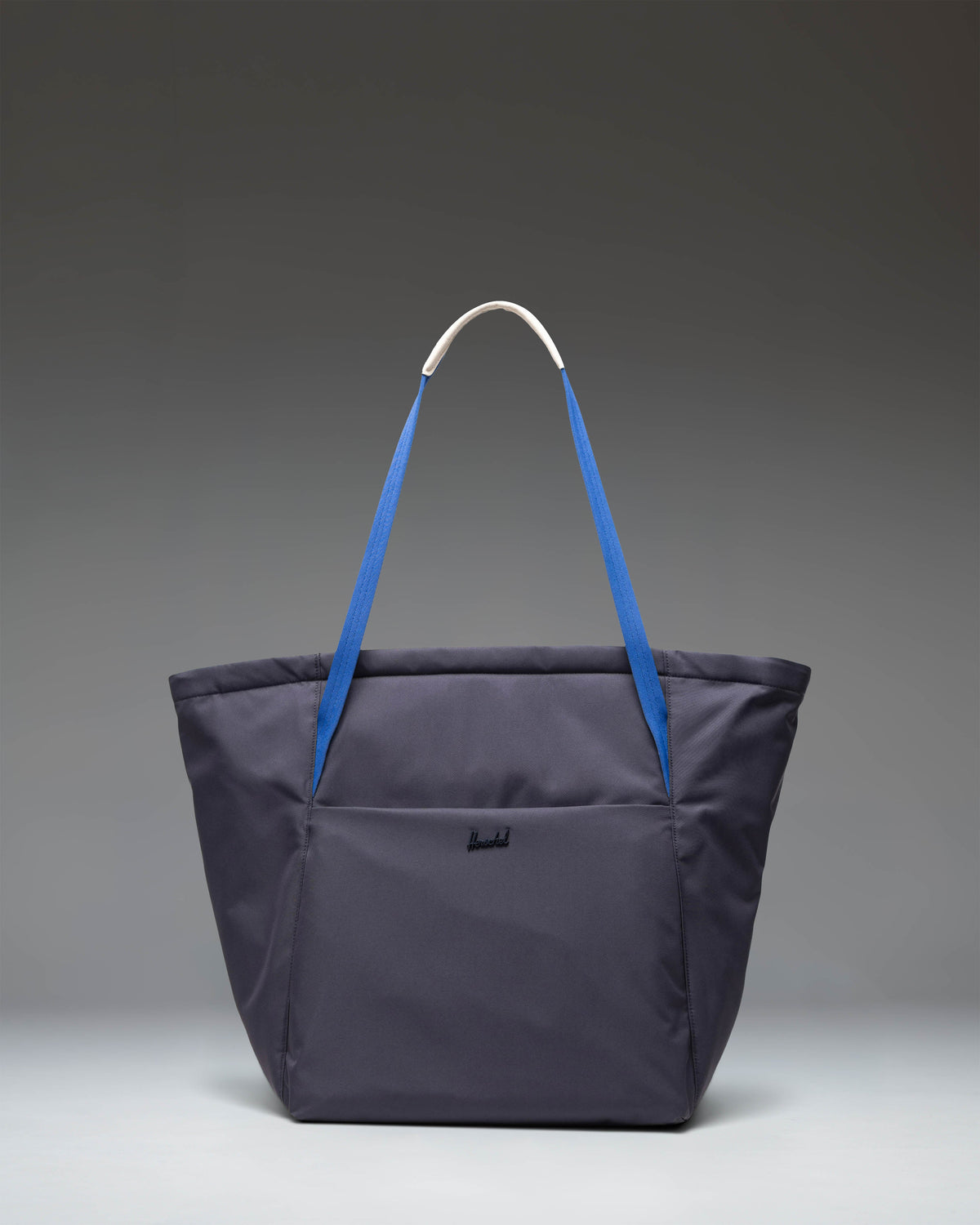 Herschel Supply Co. Joana Tote bag featuring the Realtree APX camouflage pattern.