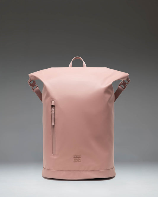 Herschel Supply Co Roll Top Backpack in Ash Rose pink, showcasing its clean design and spacious main compartment.