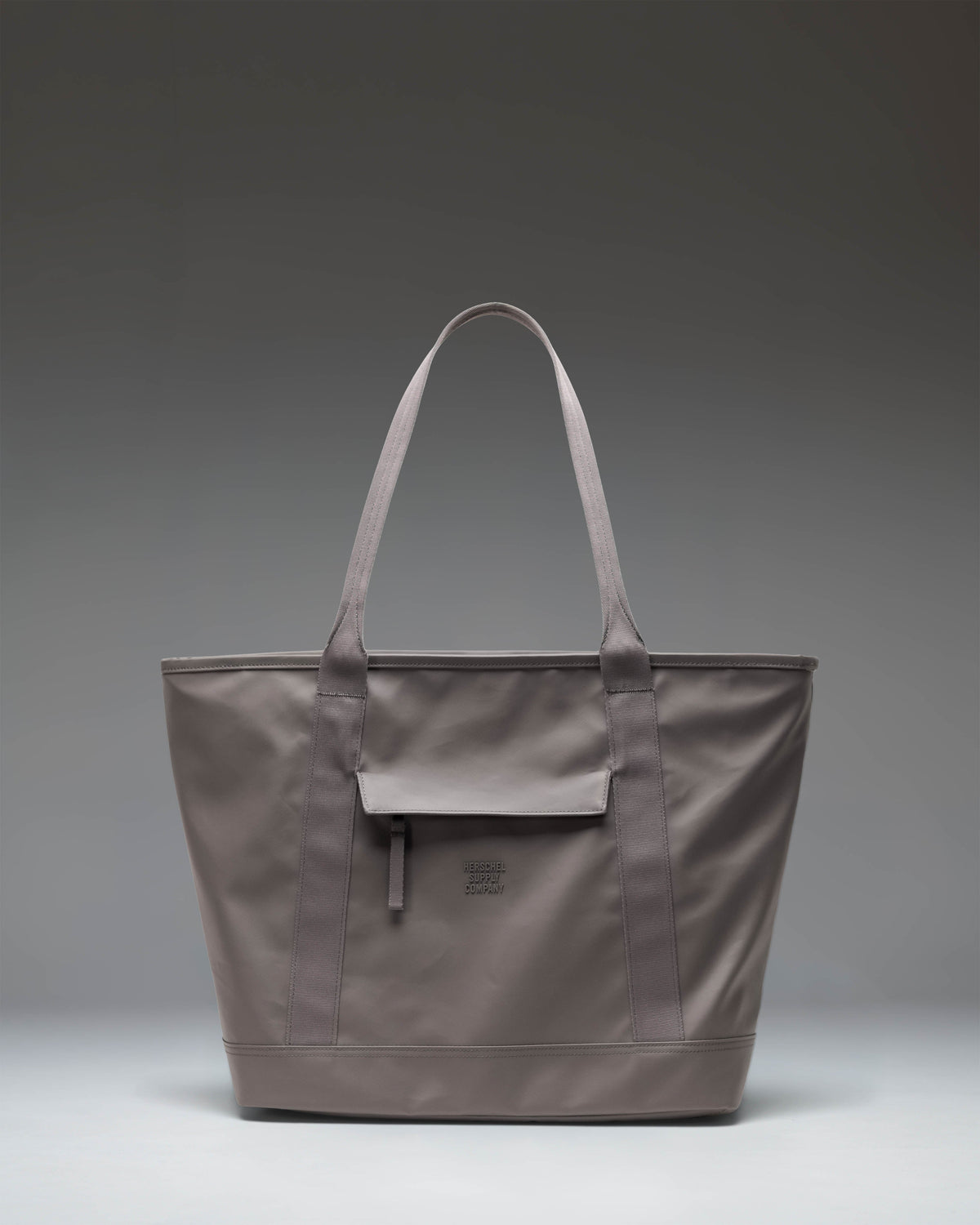 Herschel Supply Co. Alberni Tote bag in Dark Gull Gray, showing a clean front view of the durable everyday shoulder bag.