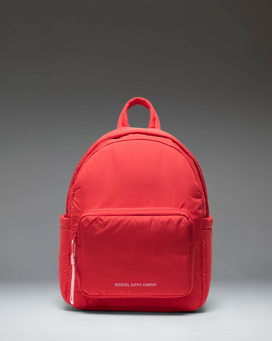 Herschel Supply Co. Cloudform Backpack in vibrant Salsa red, showcasing its clean design, main compartment, and comfortable shoulder straps.