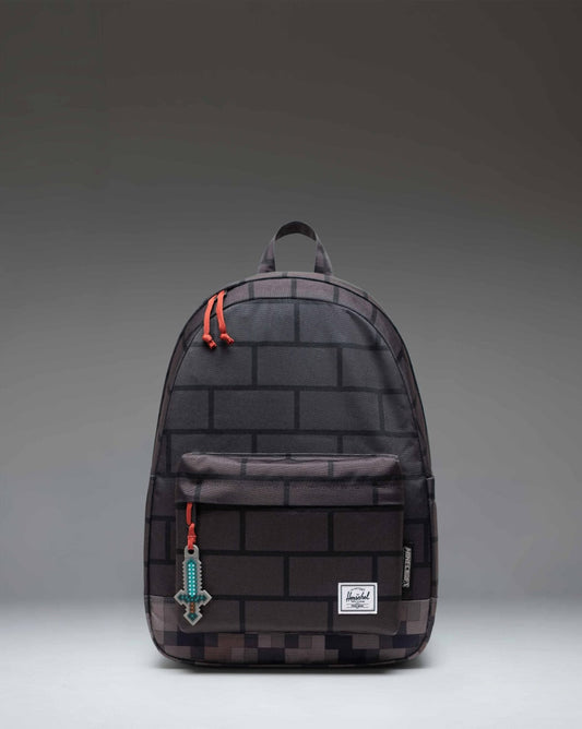 Minecraft Herschel Classic Backpack in The Nether colorway, featuring a black pixelated design with red accents.