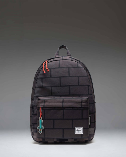 Minecraft Herschel Classic XL Backpack in The Nether colorway featuring a black and red pixelated pattern with a front storage pocket.