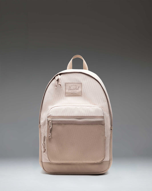 Herschel Supply Co. Kaine Backpack in French Oak Diamond/Cobblestone, featuring a multi-paneled design with utility straps and mesh pockets.