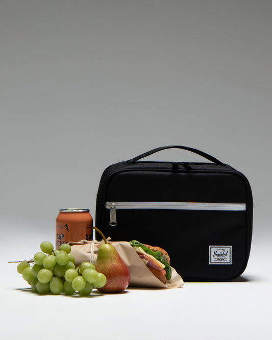 Herschel Supply Co. Pop Quiz Lunch Box in black, showing the clean, rectangular insulated lunch bag design.