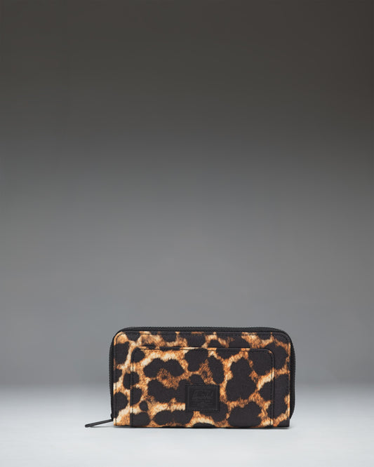 Herschel Supply Co. Thomas Wallet in Digi Leopard Light Large featuring a zip-around design, inner card slots, and a zippered coin pocket.