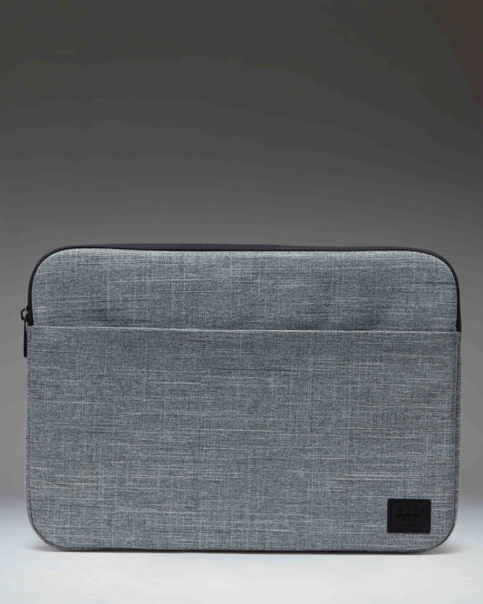 Herschel Supply Co. Denman 15-16 Inch Laptop Sleeve Tech in Raven Crosshatch grey, front view.