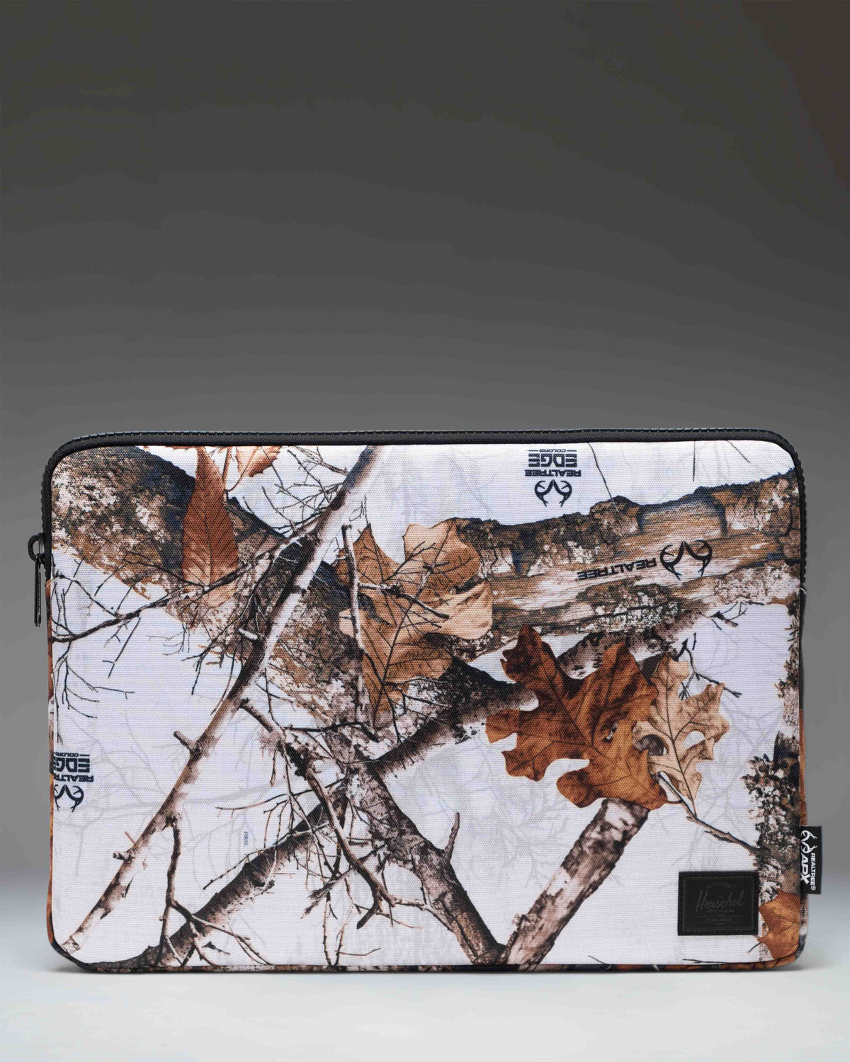 Herschel Supply Co. Realtree Anchor 15-16 Inch Sleeve in Realtree Edge Camo White/Black laptop case.
