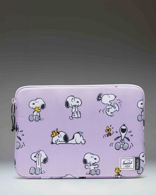Herschel Supply Co. Peanuts Anchor 14 Inch Laptop Sleeve in Snoopy and Woodstock Pastel Lilac, front view.