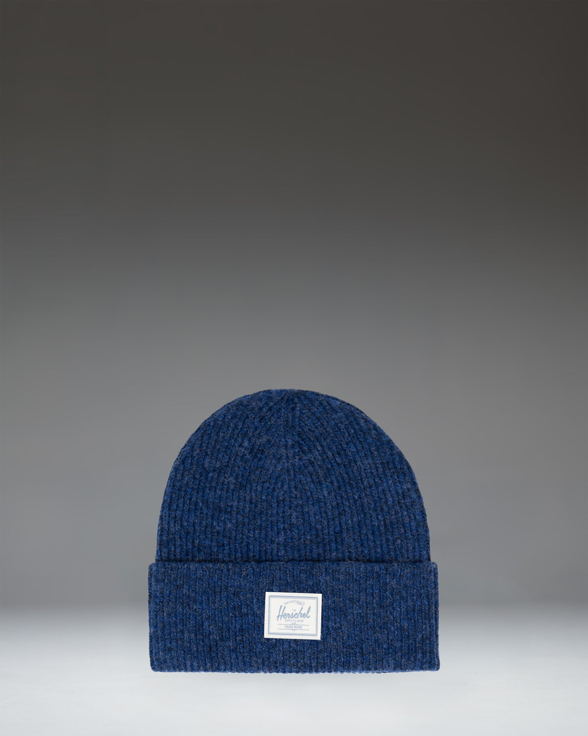 Herschel Supply Co. Super Soft Beanie in Mazarine Blue, shown from a front angle.