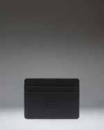 Herschel Supply Co. Charlie Cardholder Vegan Leather in Black. Front view showing multiple card slots and classic woven logo label.