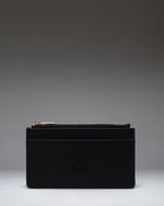 Herschel Supply Co. Oscar Large Cardholder in black vegan leather, shown from a front perspective detailing the card slots and sleek design.
