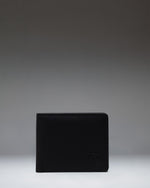Herschel Supply Co. Roy Wallet Vegan Leather in black, showing the classic bi-fold design.