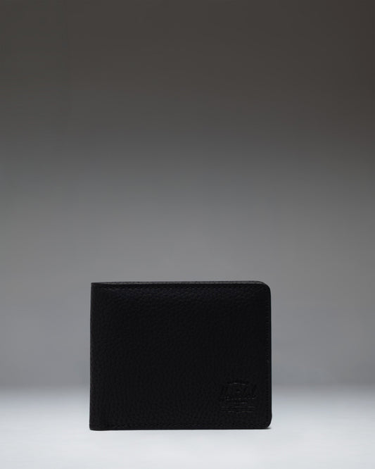 Herschel Supply Co. Roy Wallet Vegan Leather in black, showing the classic bi-fold design.