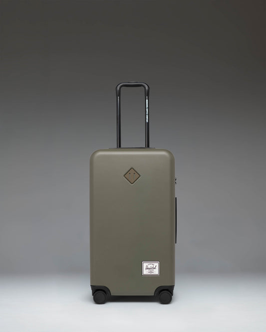 Herschel Heritage Hardshell Medium Luggage in Ivy Green.