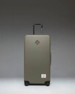 Herschel Heritage Hardshell Large Luggage in Ivy Green.
