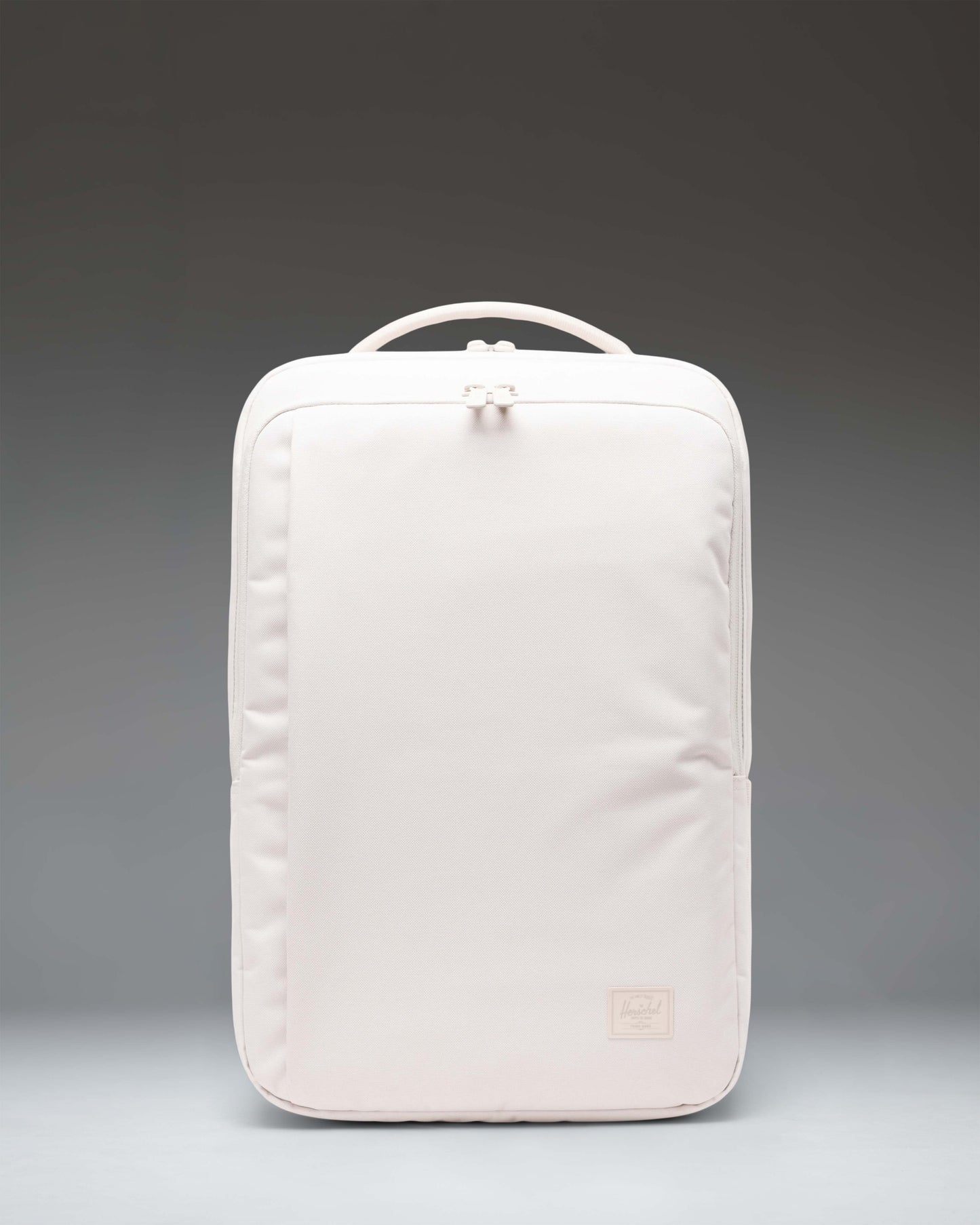 Herschel Supply Co. Kaslo Backpack Tech in Moonbeam Tonal beige. Features multiple zippered compartments and side water bottle pockets.