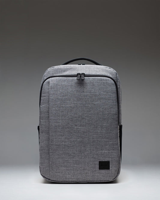 Front view of the Herschel Supply Co. Kaslo Daypack Tech in Raven Crosshatch, a grey textured backpack.