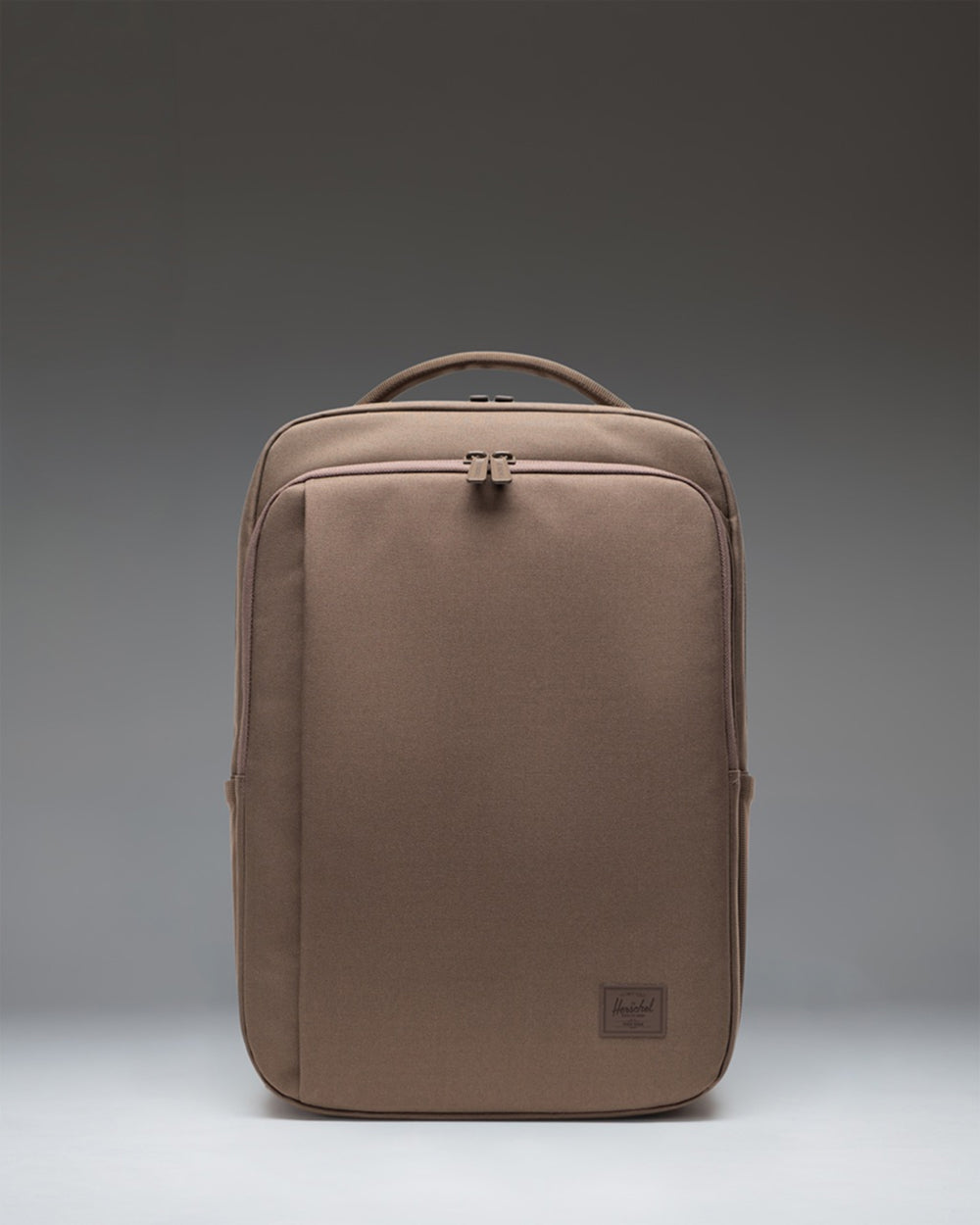 Herschel Supply Co. Kaslo Daypack Tech in light brown, shown from the front with a clean, functional design perfect for daily commute and travel.