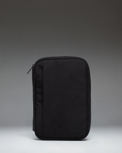 Black Herschel Supply Co. Burrard Organizer Tech pouch, front view showing the clean exterior design and classic woven label.