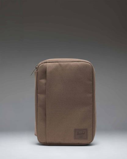 Herschel Supply Co. Burrard Organizer Tech in Light Brown, showcasing a compact and structured zippered travel pouch for electronics and accessories.