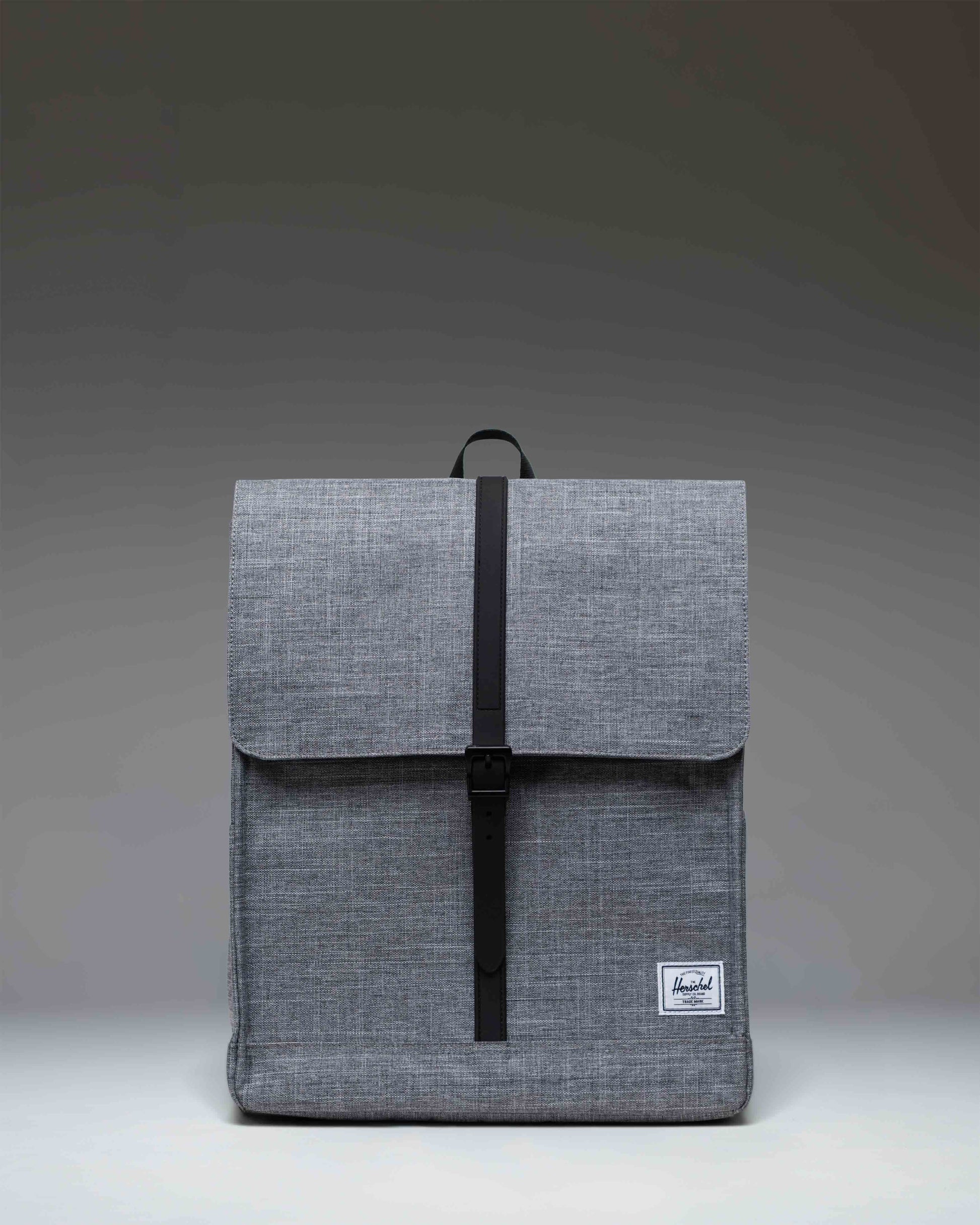 Herschel Supply Co. City Backpack in Raven Crosshatch, featuring a minimalist design with a single front strap closure.