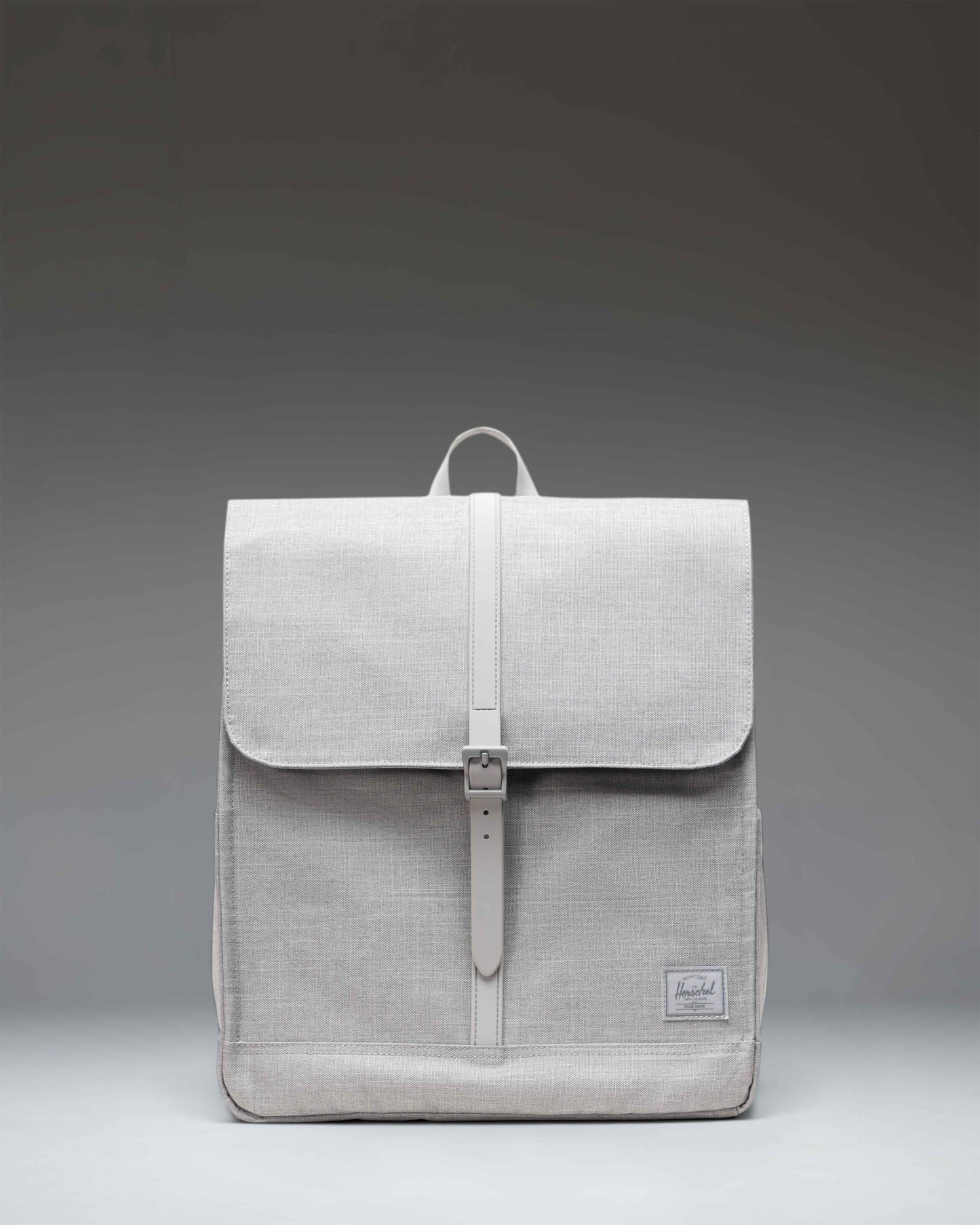 Herschel Supply Co. City Backpack in Grey Crosshatch, front view showing the clean design and single strap closure.
