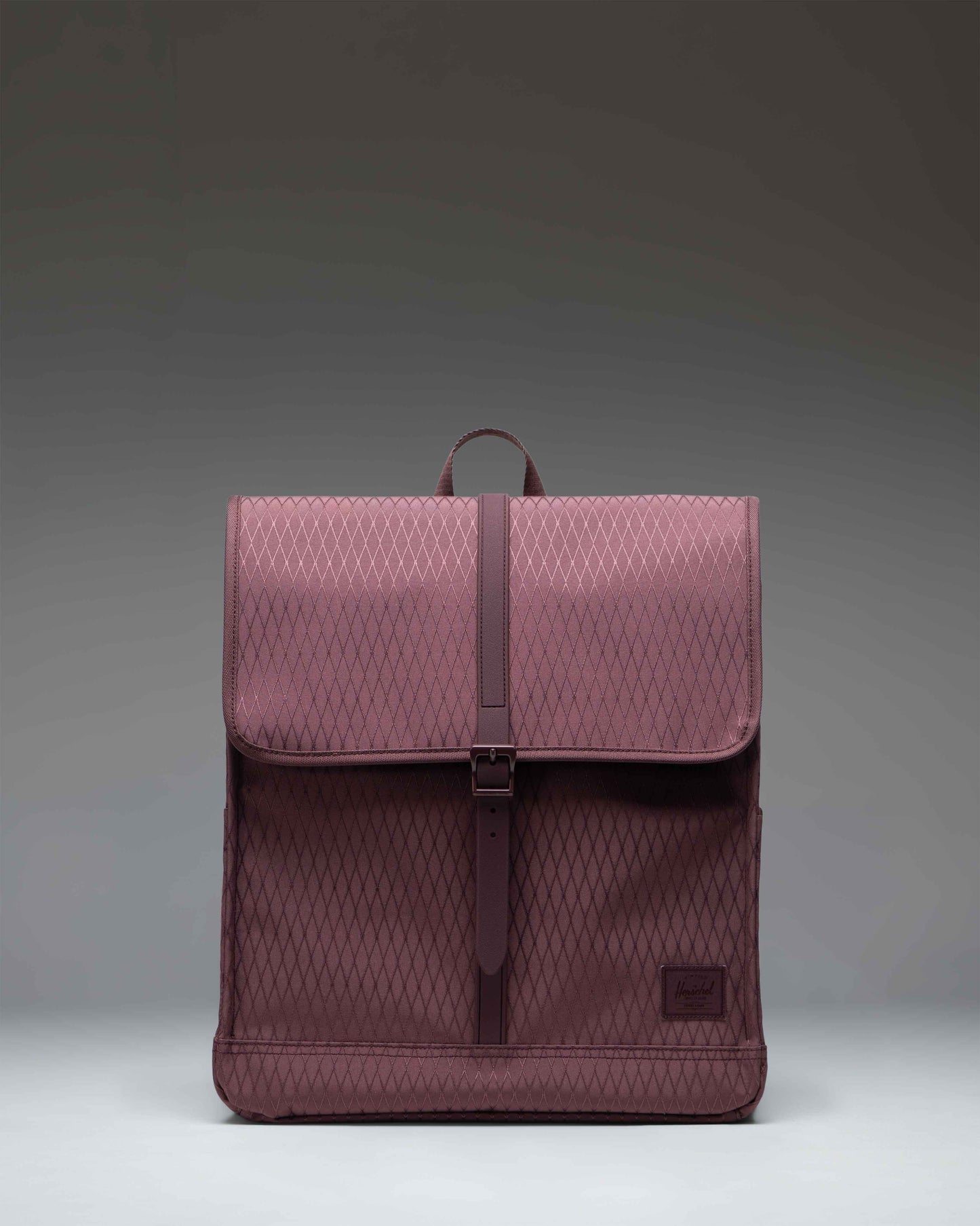 Herschel Supply Co. City Backpack in Huckleberry Diamond, a classic everyday backpack featuring a single front strap closure.