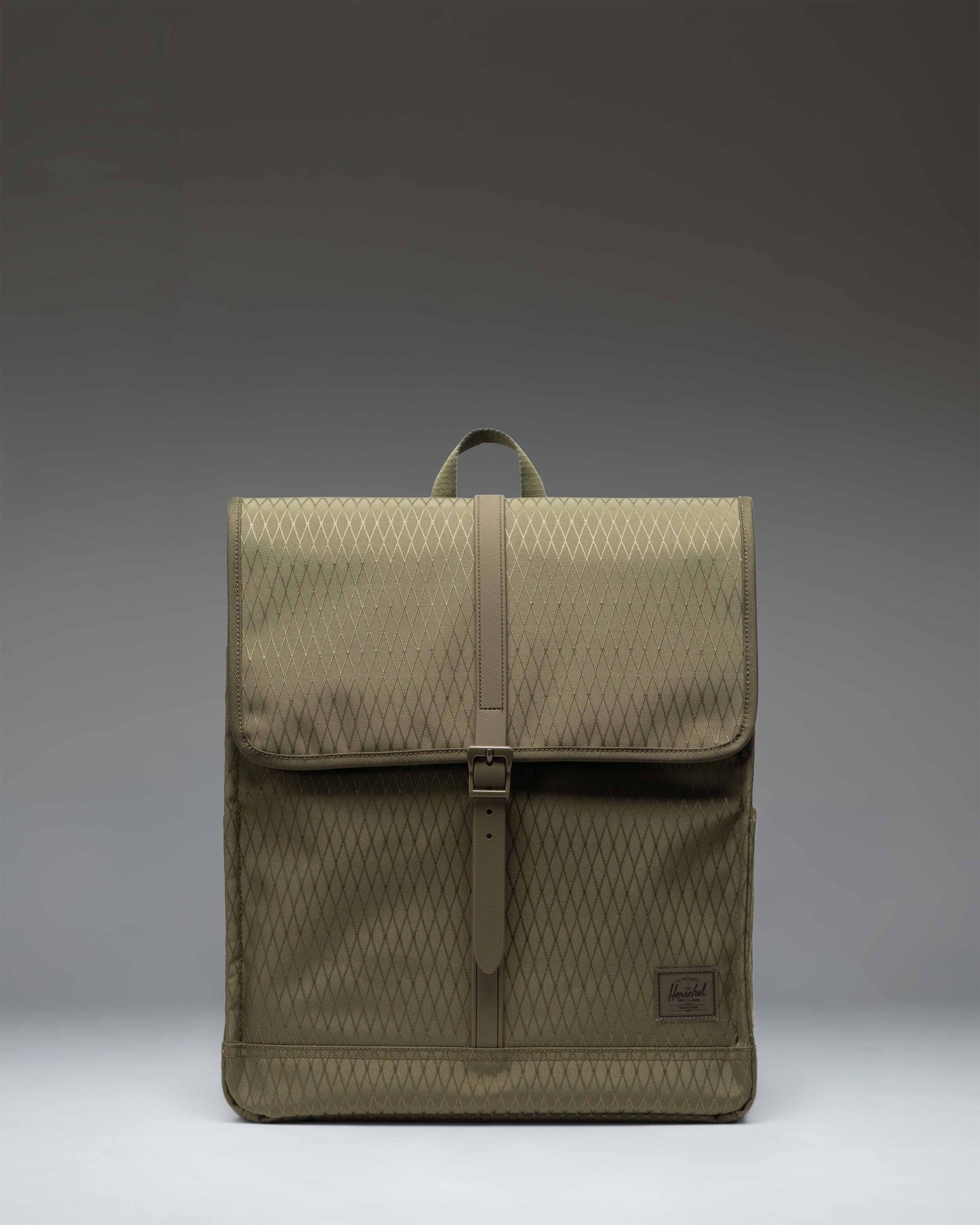 Herschel Supply Co. City Backpack in Ivy Green Diamond pattern featuring a slim design with a single strap closure and a front storage sleeve.