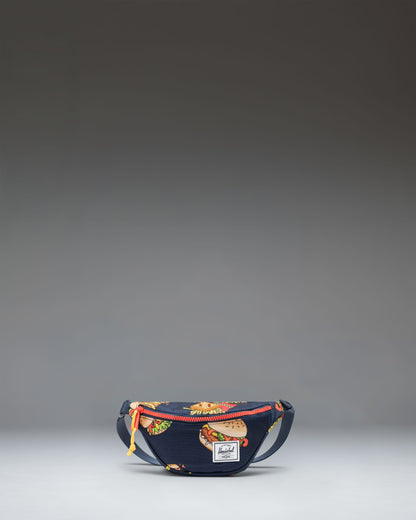 Herschel Heritage Hip Pack Little Herschel in navy blue and bright orange.