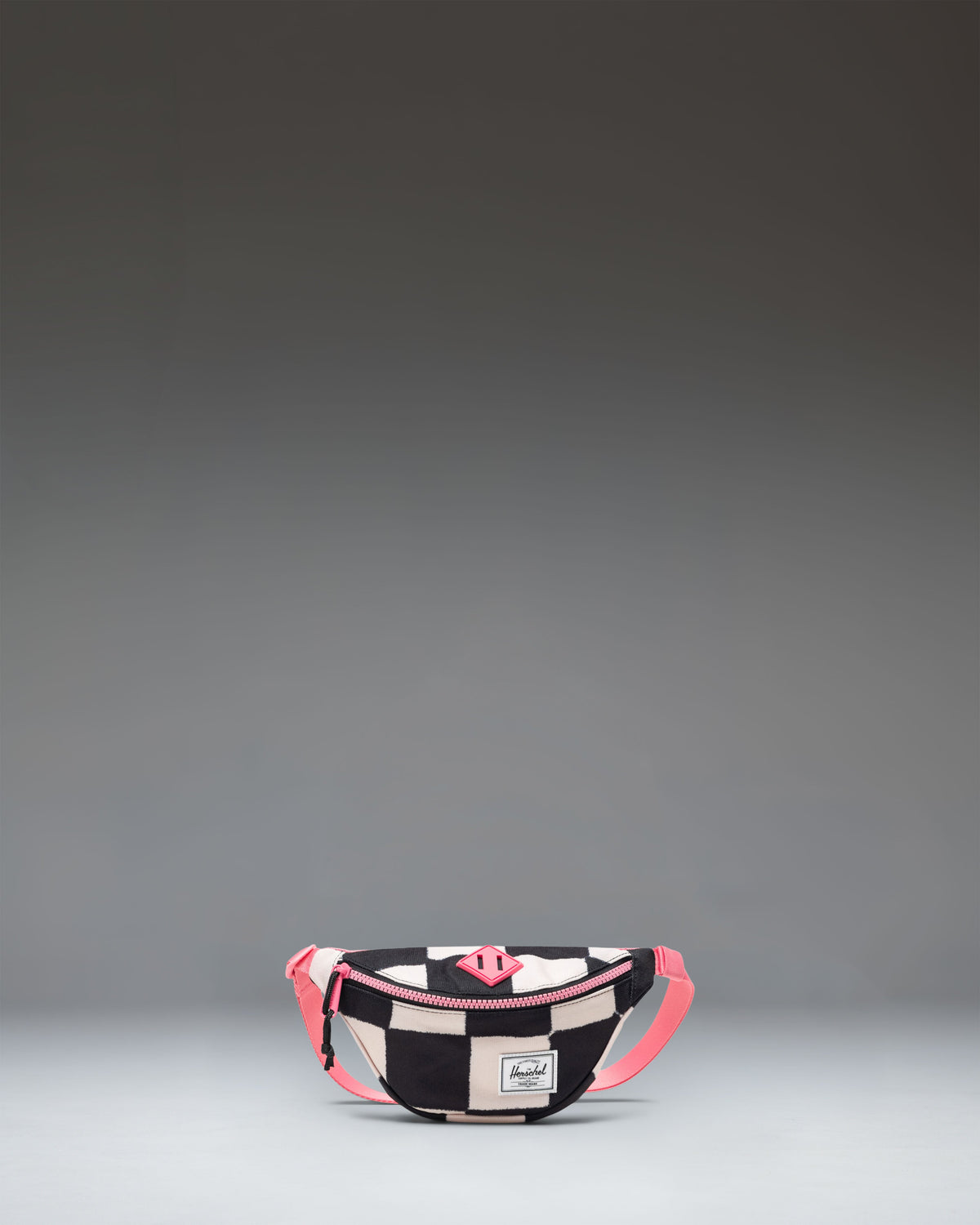 Herschel Heritage Hip Pack Little Herschel in Check This Confetti, a colorful patterned fanny pack for kids.