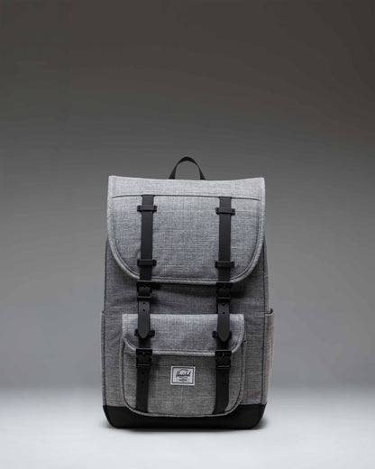 Herschel Little America Mid Backpack in Raven Crosshatch grey with black rubber straps and a classic woven label.