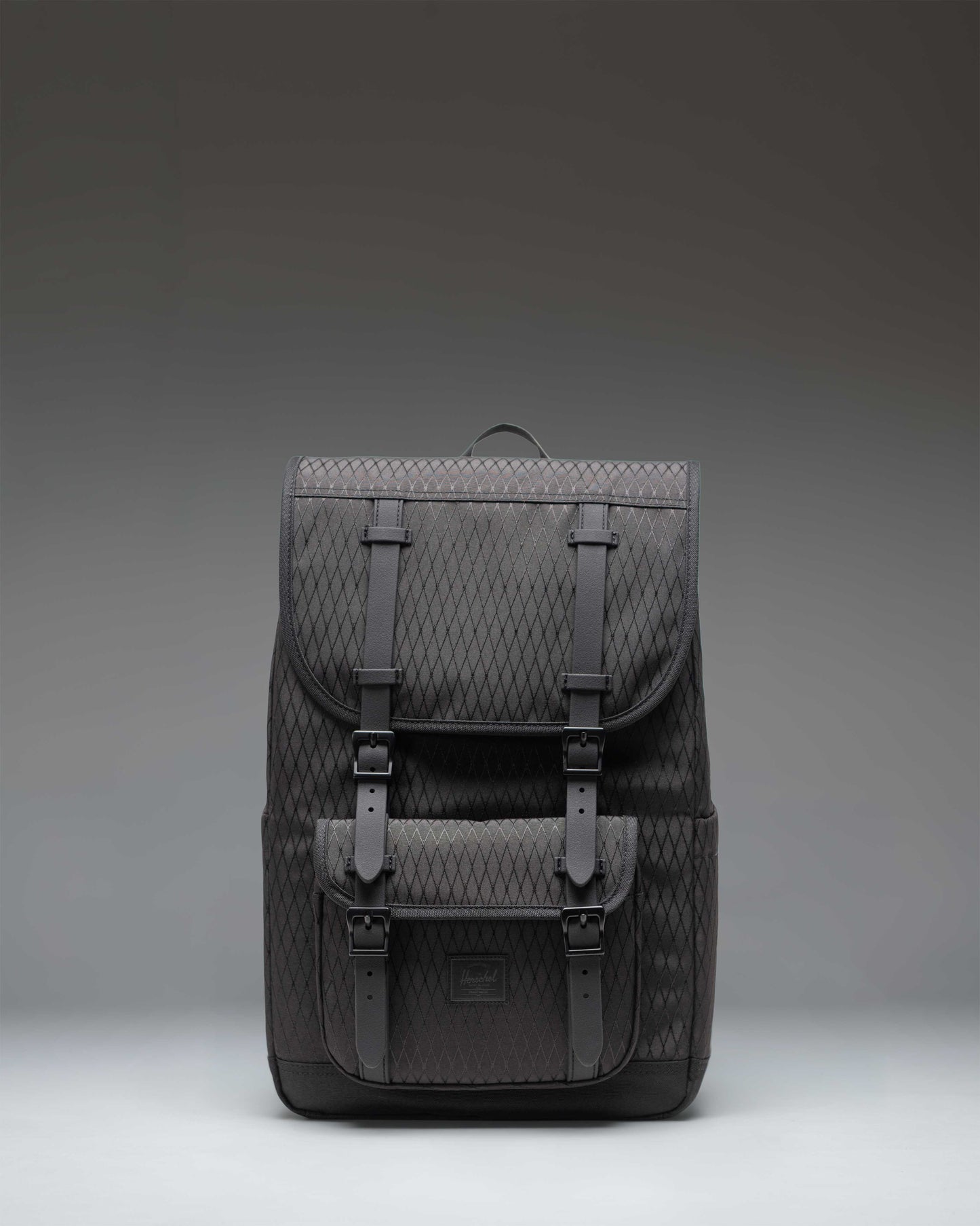 Herschel Little America Mid Backpack in Black Diamond/Black, featuring a classic mountaineering design with dual rubber straps and front pocket.