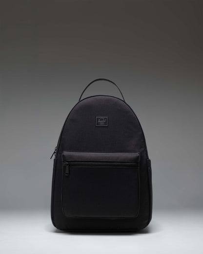 Herschel Nova Backpack in Black Tonal, showing the front view with dual top carrying handles and a front storage pocket.
