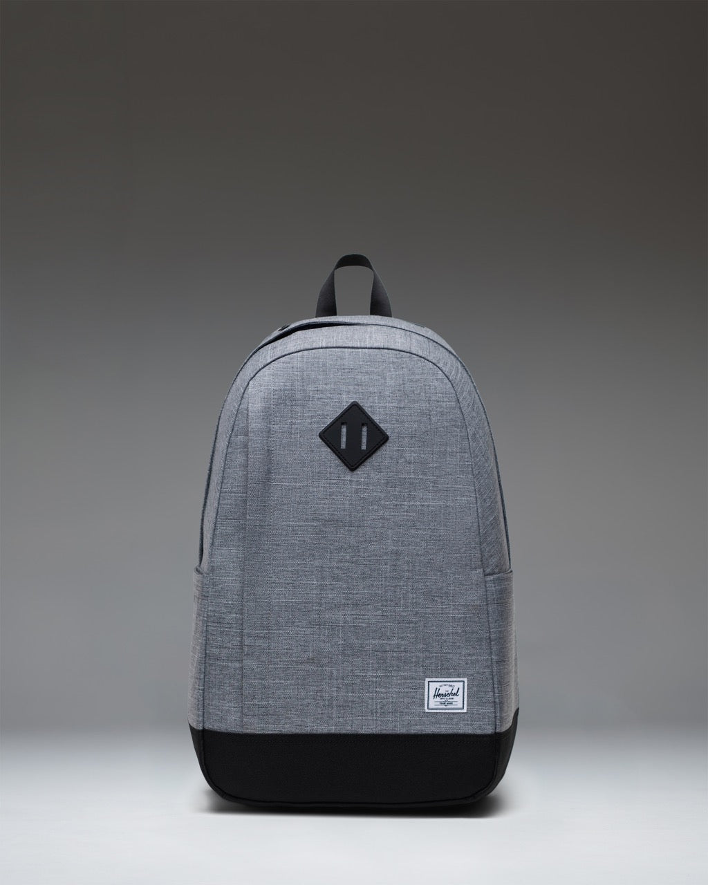 Herschel Seymour Backpack in Raven Crosshatch heather gray with dual black straps and a classic woven label.