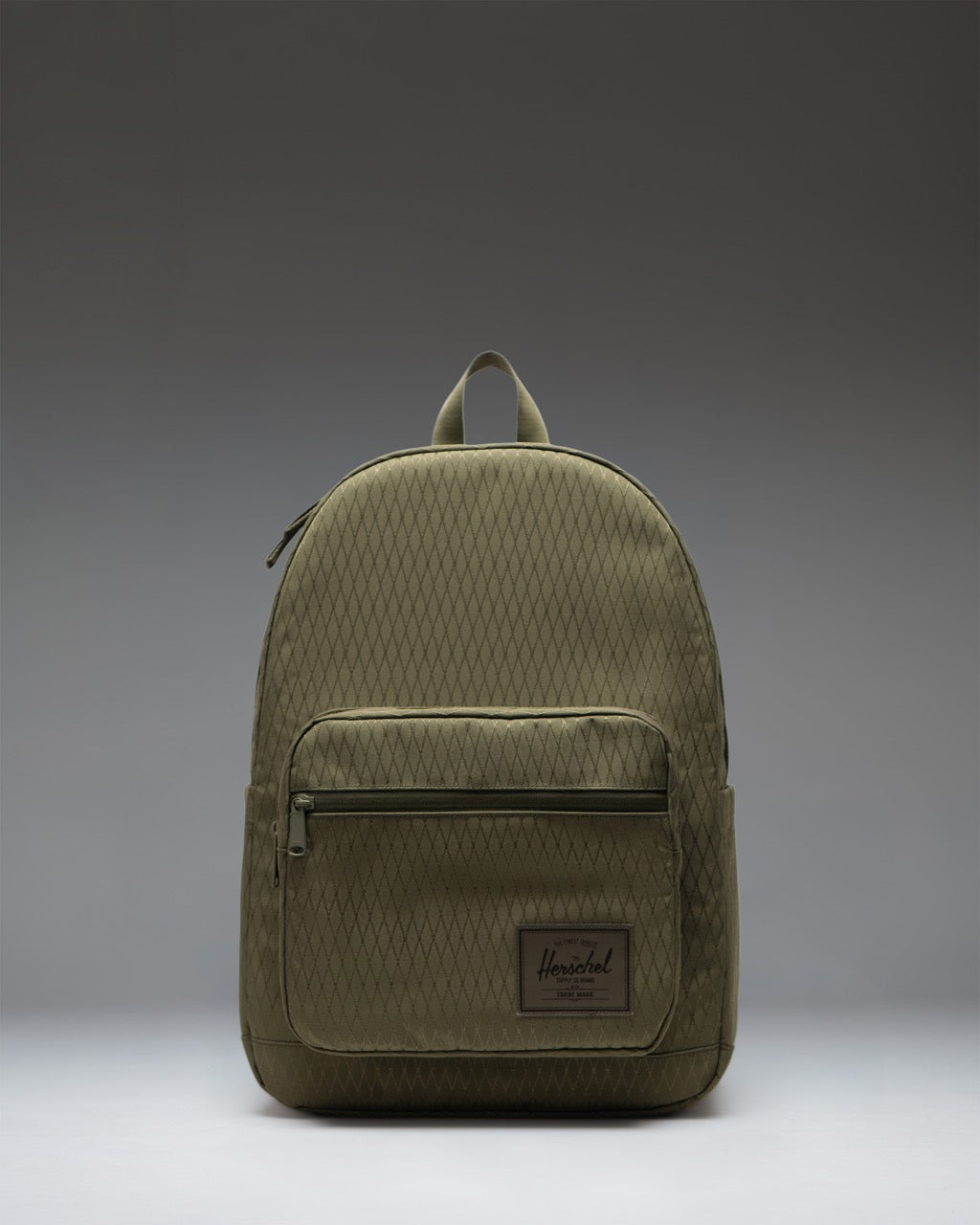 Herschel Supply Co. Pop Quiz Backpack in Ivy Green Diamond featuring a classic design with a front storage pocket and zipper detailing.