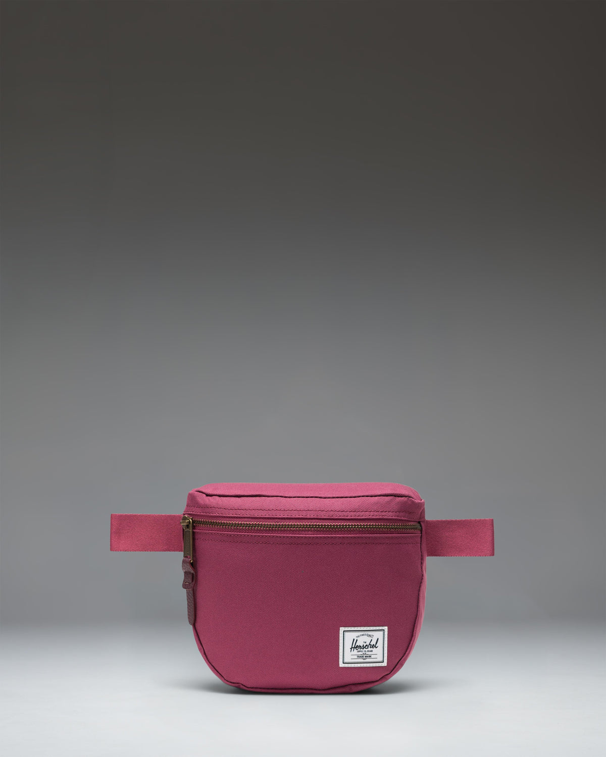 Herschel Supply Co. Settlement Hip Pack in Violet Quartz, showing a front view of the light purple waist bag.