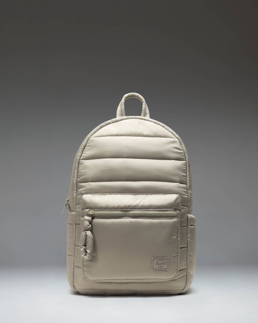 Herschel Supply Co. Settlement Backpack in Abbey Stone, featuring a front storage pocket and classic woven label.