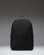Herschel Supply Co. Beatrix Backpack in black, showing the front view with classic straps, zippers, and signature logo patch.