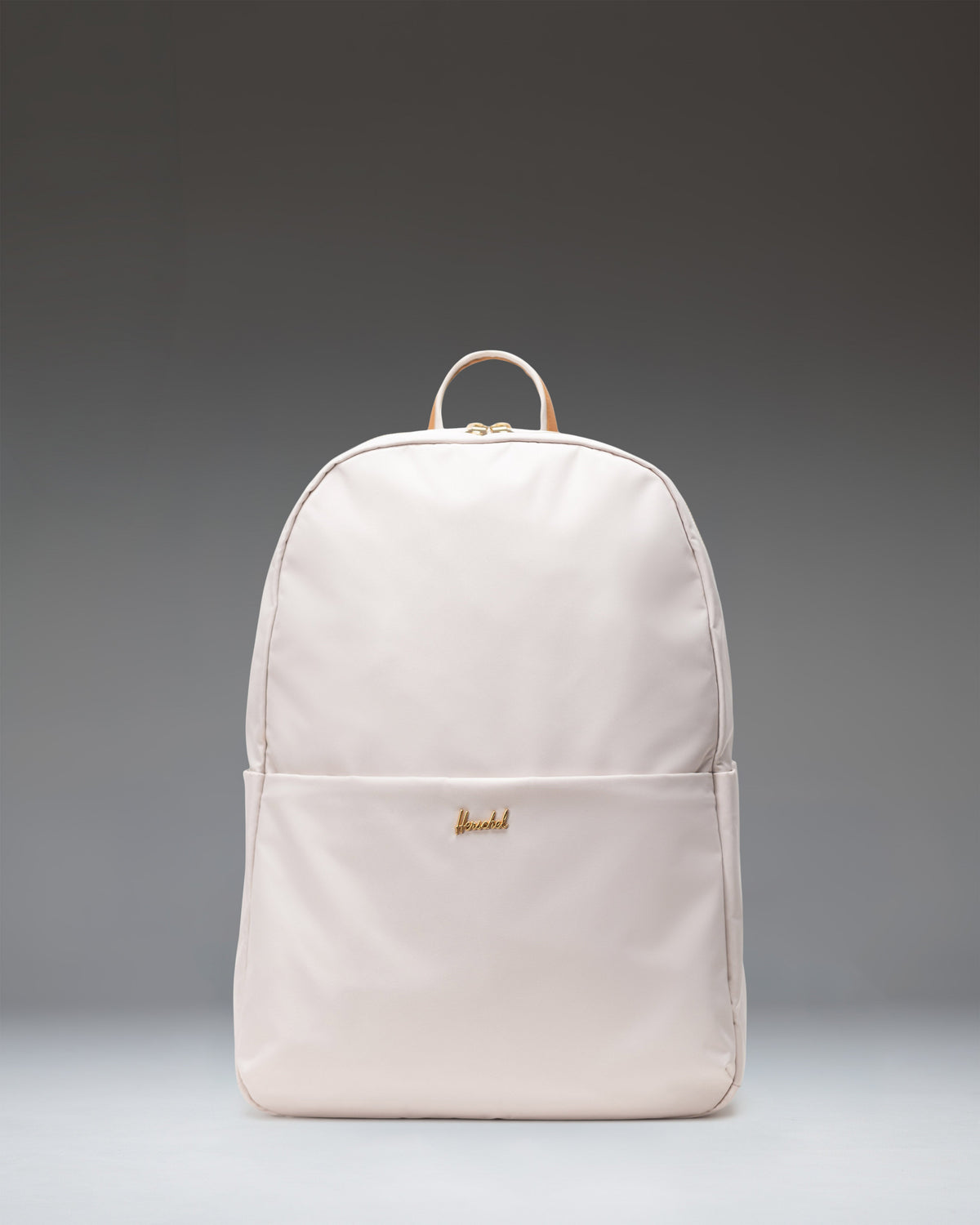 Herschel Supply Co. Beatrix Backpack in Moonbeam, front view showing its clean, minimalist design and light beige color.