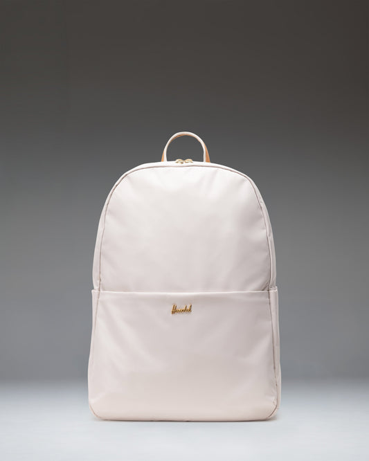 Herschel Supply Co. Beatrix Backpack in Moonbeam, front view showing its clean, minimalist design and light beige color.