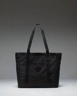 Herschel Heritage Tote bag in black, showcasing a classic design with dual top handles.