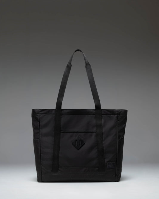 Herschel Heritage Tote bag in black, showcasing a classic design with dual top handles.