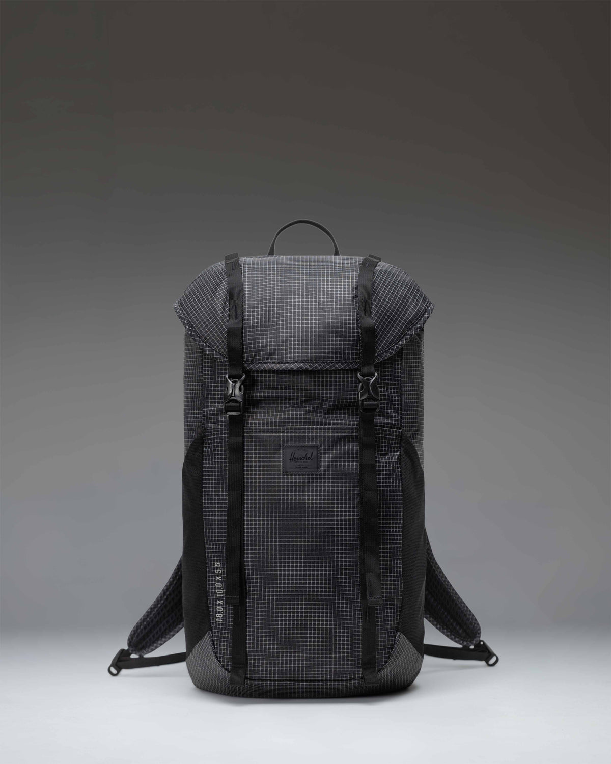 Black Herschel Supply Co Ultralight Backpack 22 L shown from the front with adjustable shoulder straps and top handle.