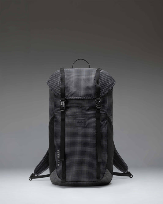 Black Herschel Supply Co Ultralight Backpack 22 L shown from the front with adjustable shoulder straps and top handle.