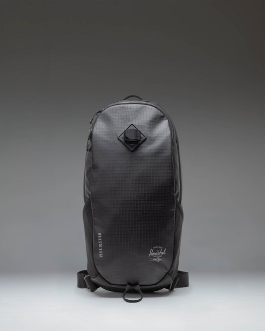 Black Herschel Supply Co. All Season Backpack 17L shown from the front, featuring a clean, minimalist design with a top handle and shoulder straps.