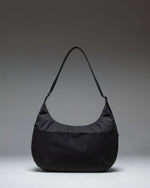 Herschel Supply Co. Yara Large Shoulder Bag in black, shown from the front.