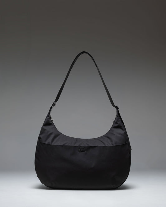 Herschel Supply Co. Yara Large Shoulder Bag in black, shown from the front.