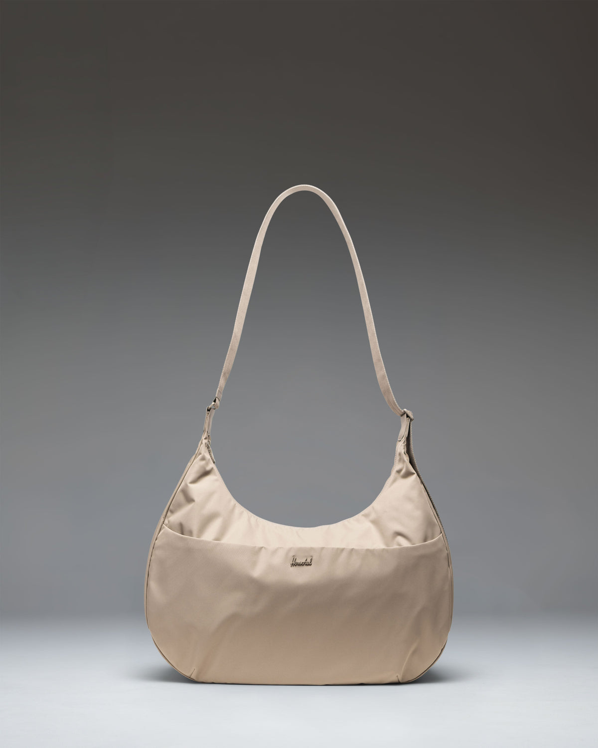 Herschel Supply Co. Yara Large Shoulder Bag in Vintage Khaki, featuring a slouchy silhouette and a single comfortable shoulder strap.