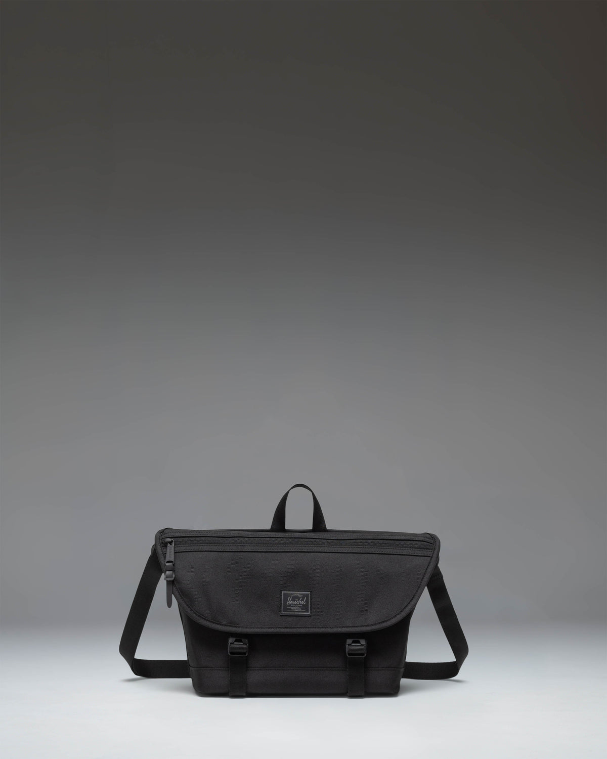 Herschel Supply Co. Cove Small Messenger bag in Black Tonal.