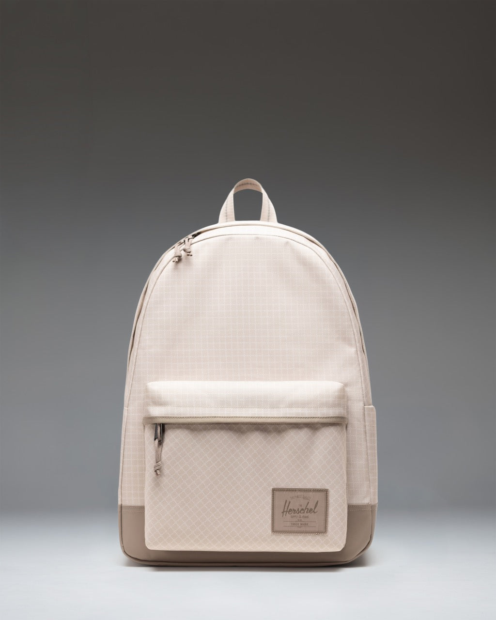 Herschel Classic XL Backpack in Grid Pelican/Roasted Cashew, featuring a spacious main compartment, front pocket, and classic woven label.